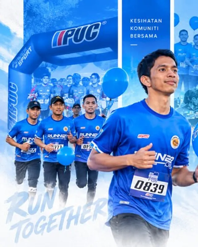 Peserta PUC Balloon Run berlari dengan belon biru